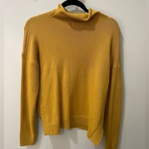 Tahari size medium mustard colored sweater. New without tags